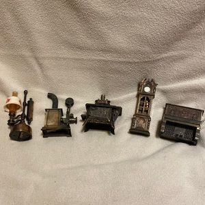 Vintage Die Cast Pencil Sharpeners. Oil lamp. Player piano. Grandfather clock.